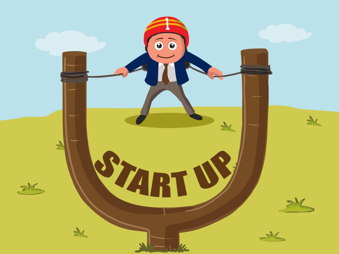 Ilustración de un emprendedor sobre un tirachinas con la palabra startup